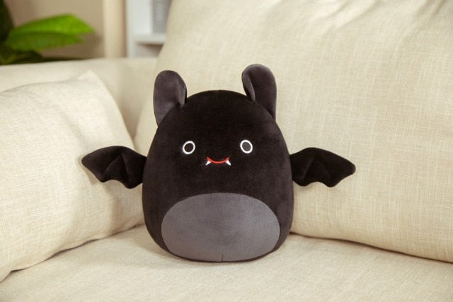 Plush bat toy with wings spread