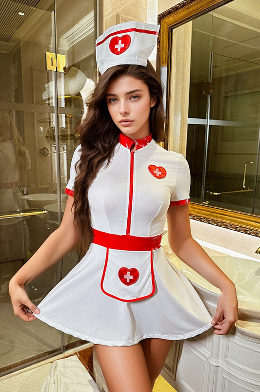 White nurse mini dress with red trim, an apron panel, front zipper and matching white headpiece.