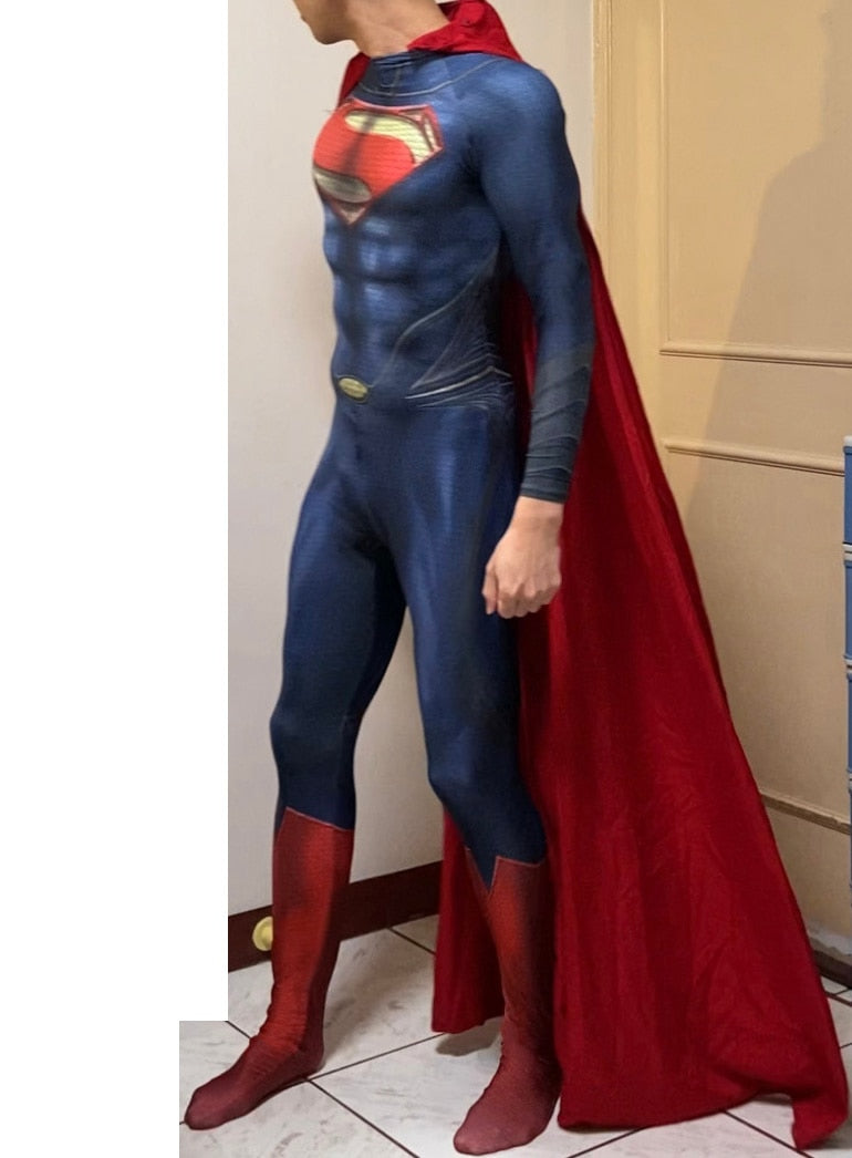 Blue and red Superman-style jumpsuit costume with cape, worn by an adult, full body